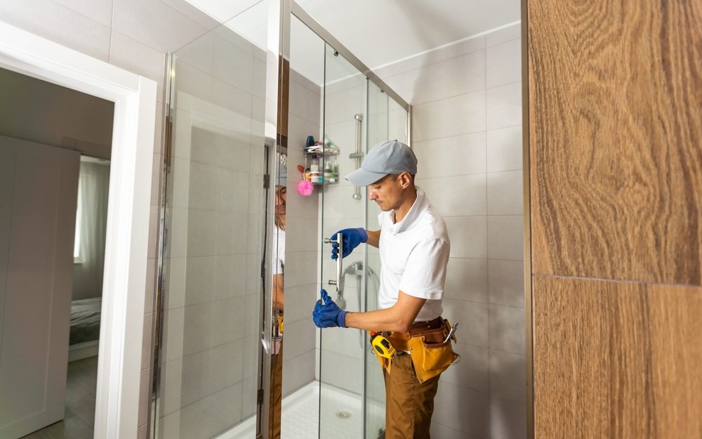 Young,Plumber,Fixing,Shower,Cabin