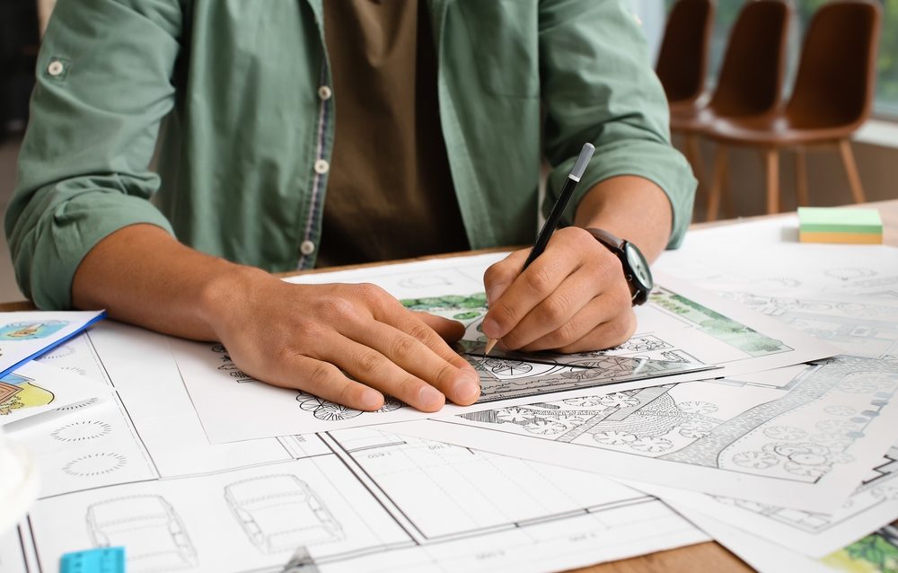 Young,Male,Landscape,Designer,Working,In,Office